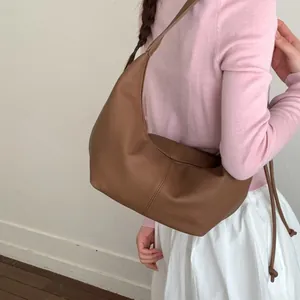 Vintage brown pleated crescent shoulder bag with minimalist leather design for women
