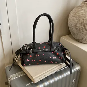 Minimalist black oxford lunch bag with red floral print and adjustable silver buckle