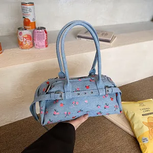 Light blue floral oxford canvas boston lunch bag with red roses and long shoulder straps