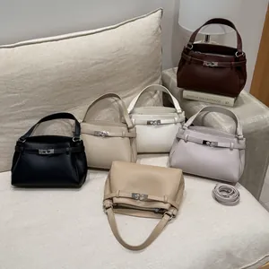 Leather top handle crossbody bags in six colors with classic metal turn-lock closure