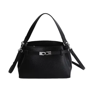 Chic black lychee grain leather square handbag with silver interlocking buckle and strap