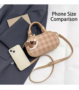 Mini Boston plaid handbag with horse charm and phone for size comparison reference