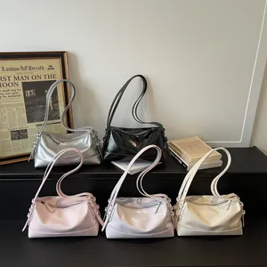Minimalist glossy leather shoulder pillow bags in five assorted colors with knot details