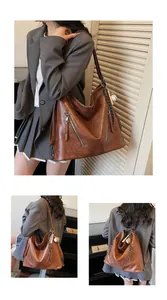 Detail view of deep brown vintage backpack showing zipper accents and leather texture