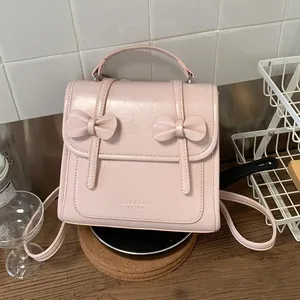 Petit Sac à Dos Femme à Nœud en Cuir PU Style Collège Doux Sac d'École Voyage pour Navetteurs Résistant à l'Usure
