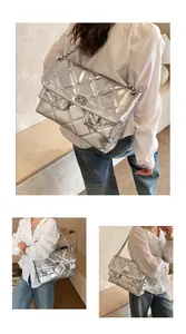 Detailed views of a silver quilted chain bag worn by a model in casual spring outfit