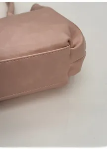 Close-up of pink tote bag with reinforced wide base and professional stitching detail