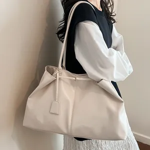 Minimalist large capacity cream white glossy faux leather tote bag for women commuting
