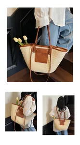 Detail of straw woven tote bag featuring brown leather straps and front pocket detail