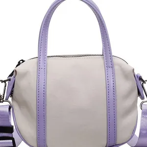 Minimalist lavender and beige canvas handbag with adjustable wide shoulder strap