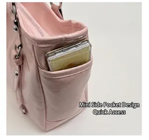 Detailed close-up of side pocket on pink glossy tote bag with functional insert