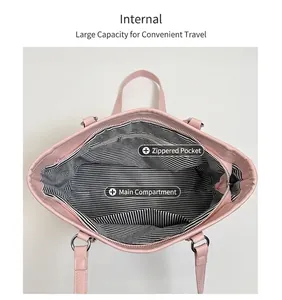 Pink tote bag interior showing striped lining and functional zipper pocket storage