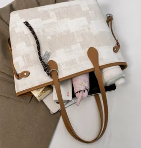 Spacious tote bag interior showing capacity for iPad, umbrella, and daily essentials