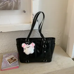 Retro black patent leather tote bag with silver hardware and cute plush doll charm