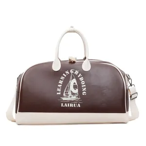 Bolso de viaje vintage marrón y blanco con estampado de velero y bandolera