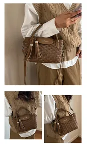 Close-up of brown textured bucket bag with tassel details and crystal-ring charms