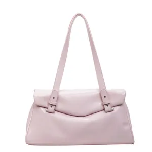 Minimalist light pink tote bag with stylish folding flap design and dual top handles