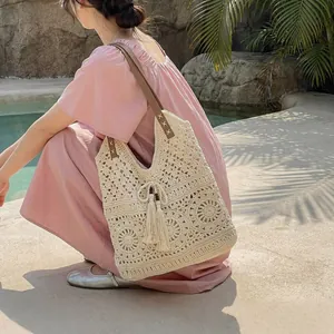 Large capacity woven tote bag with ivory crochet floral pattern and brown leather straps