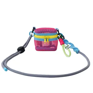 Mini mesh crossbody bag in pink and blue with adjustable cord strap and colorful charms