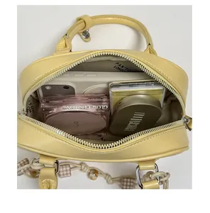 Interior view of soft leather handbag with ample space for makeup and smartphone