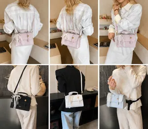 Collage of four vintage small square bags in pink, black, white, and blue with lace bows