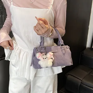 Large capacity lavender faux leather bucket bag with plush rabbit charm and metal logo