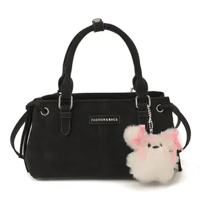 Large capacity black matte shoulder bag with drawstring detail and cute bear charm