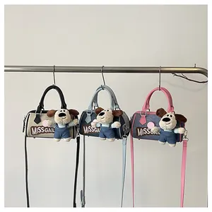 Three colorful cartoon Boston bags with MISSGAIL embroidery and plush puppy charms