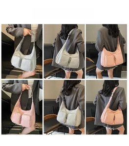 Detail shots of versatile crossbody hobo bag with dual front pockets and adjustable strap