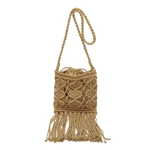 Handmade beige macrame crossbody bag with long tassels and drawstring satin liner