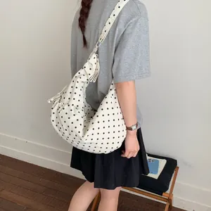 Chic cream polka dot hobo shoulder bag for women with adjustable drawstring closure