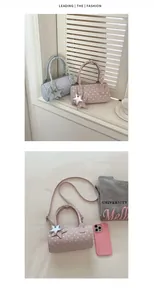 Close-up of polka dot bowling bags in light blue and pink with star-shaped charms