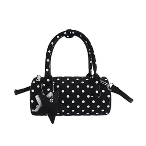 Polka dot pattern bowling handbag with star charm and adjustable strap for women