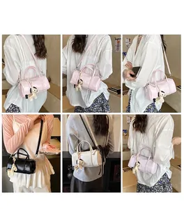 Detail view of stylish Boston bags in four colors featuring cute horse charms and straps