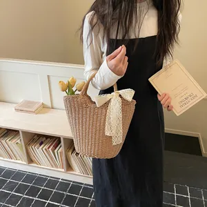 French style woven straw tote bag with a lace bow and tulip decoration