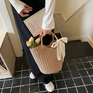 Large capacity woven straw tote bag with elegant white lace bow for daily summer commute