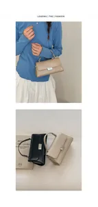 Detail of a minimalist rectangular handbag with metal buckle and top handle in chic beige