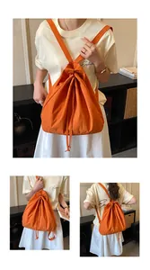 Detailed views of a vibrant orange drawstring nylon backpack for cycling and daily use