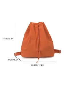 Detailed view of orange nylon drawstring backpack with size dimensions 35x33.5x11cm