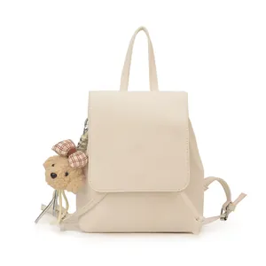 Minimalist beige PU leather backpack for women with a cute brown plush bear charm