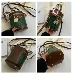 Detailed views of vintage green cylinder bucket bag with DM embossing and floral silk scarf