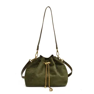 Vintage forest green frosted leather drawstring bucket bag with gold chain accents