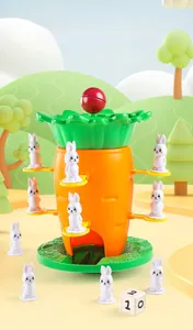 Close-up of the carrot balance tower game featuring white bunnies and green tray