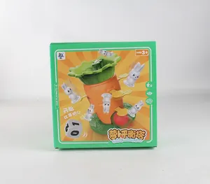 Close-up of Radish Balancing Tower board game box with cute rabbit figures and a dice
