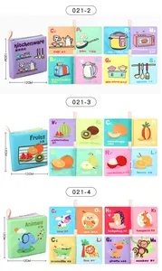 Detailed views of baby cloth books featuring fruits and kitchen themes with hanging loops