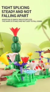Detailed view of child's hand assembling a colorful DIY floral garden building block set