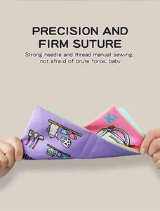 Detail showing tear-resistant baby cloth book with reinforced stitching and kitchen prints