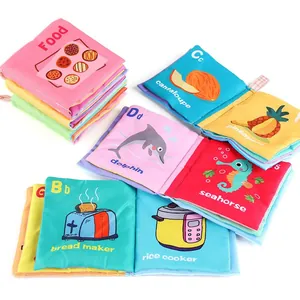 Educational baby cloth book set featuring ocean, fruit and food themes for sensory learning