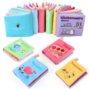 Set of colorful soft baby cloth books featuring animal, ocean, and food educational themes