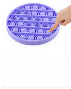 Detail showing hand pressing purple silicone push pop fidget toy game instructions